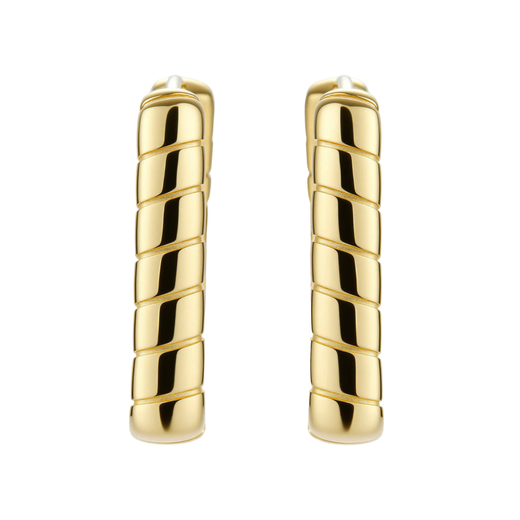 Chunky segmented gold-plated huggie hoop earrings with bamboo-inspired geometric design on white background.