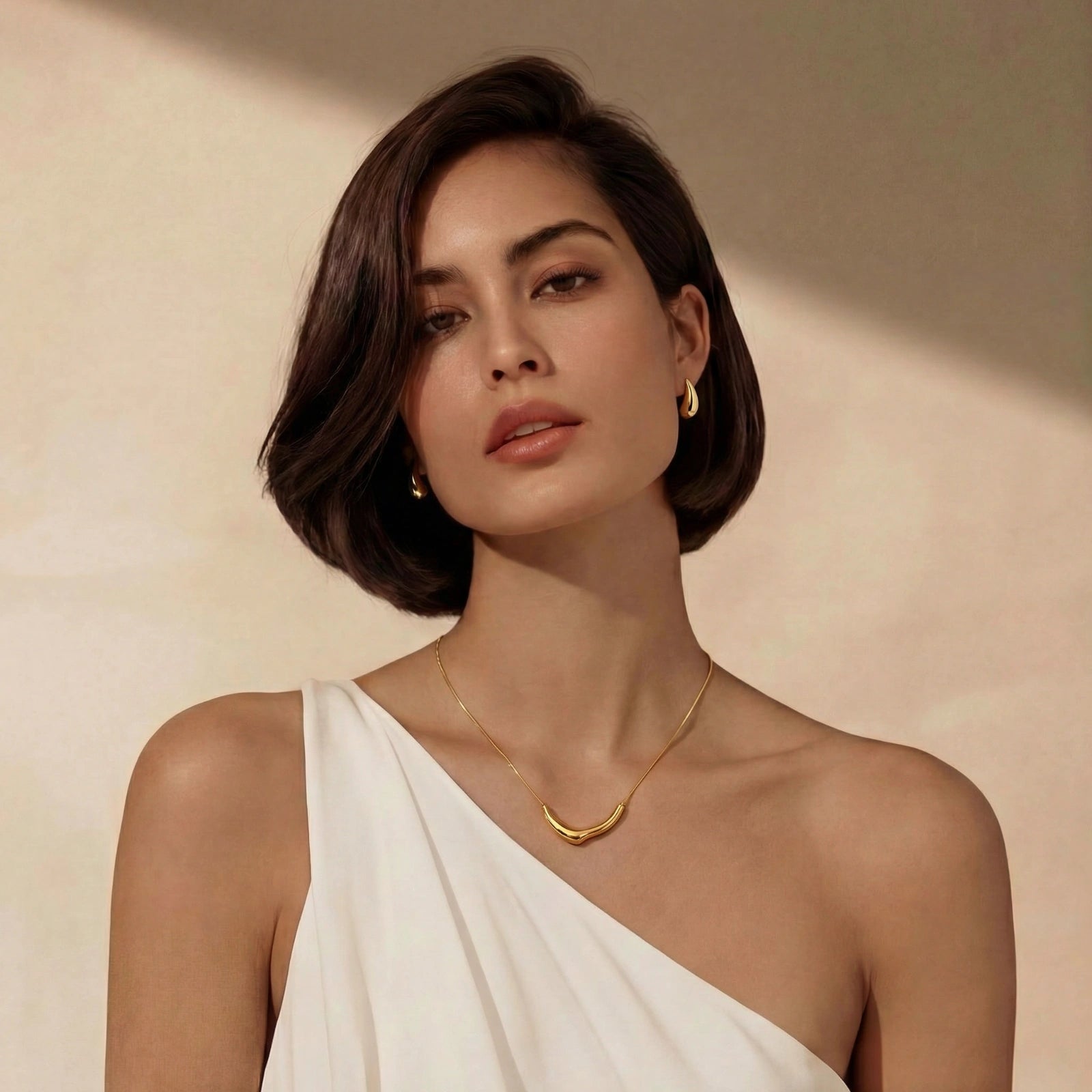 Boucles d'oreilles en forme de larme dorées