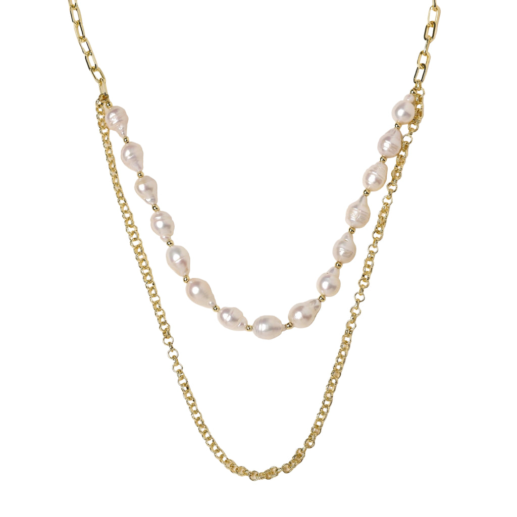 Layered gold chain necklace with organic baroque freshwater pearls and adjustable length on cream background