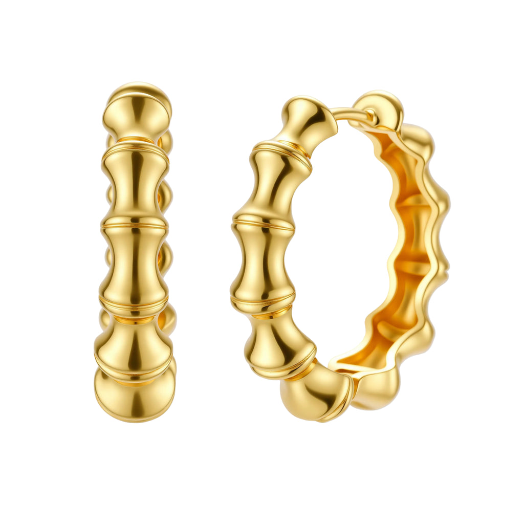 Close-up of gold-plated sterling silver hoop earrings with bamboo-inspired segmented design on white background.