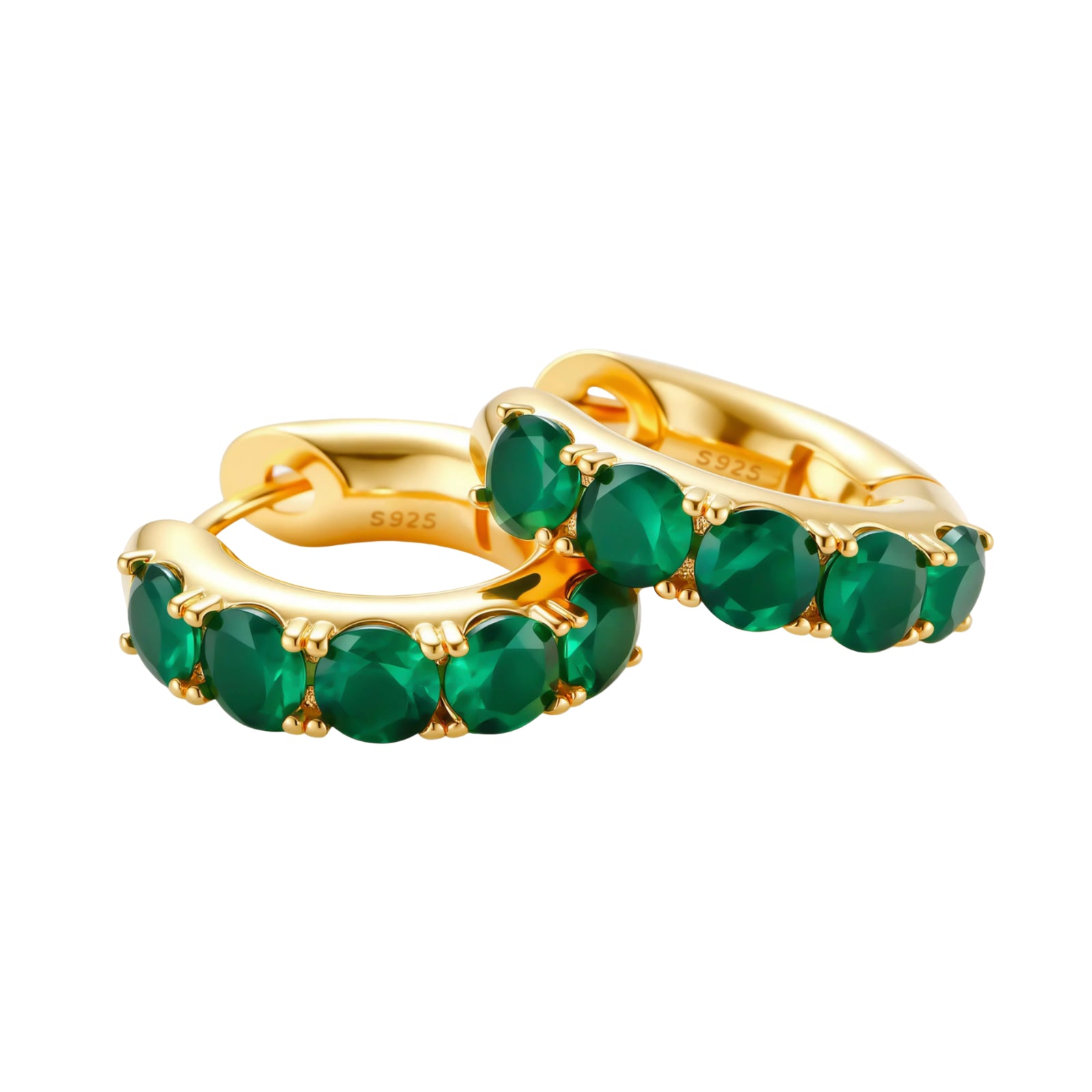Close-up of gold-plated huggie hoop earrings featuring four emerald green cubic zirconia stones on white background.