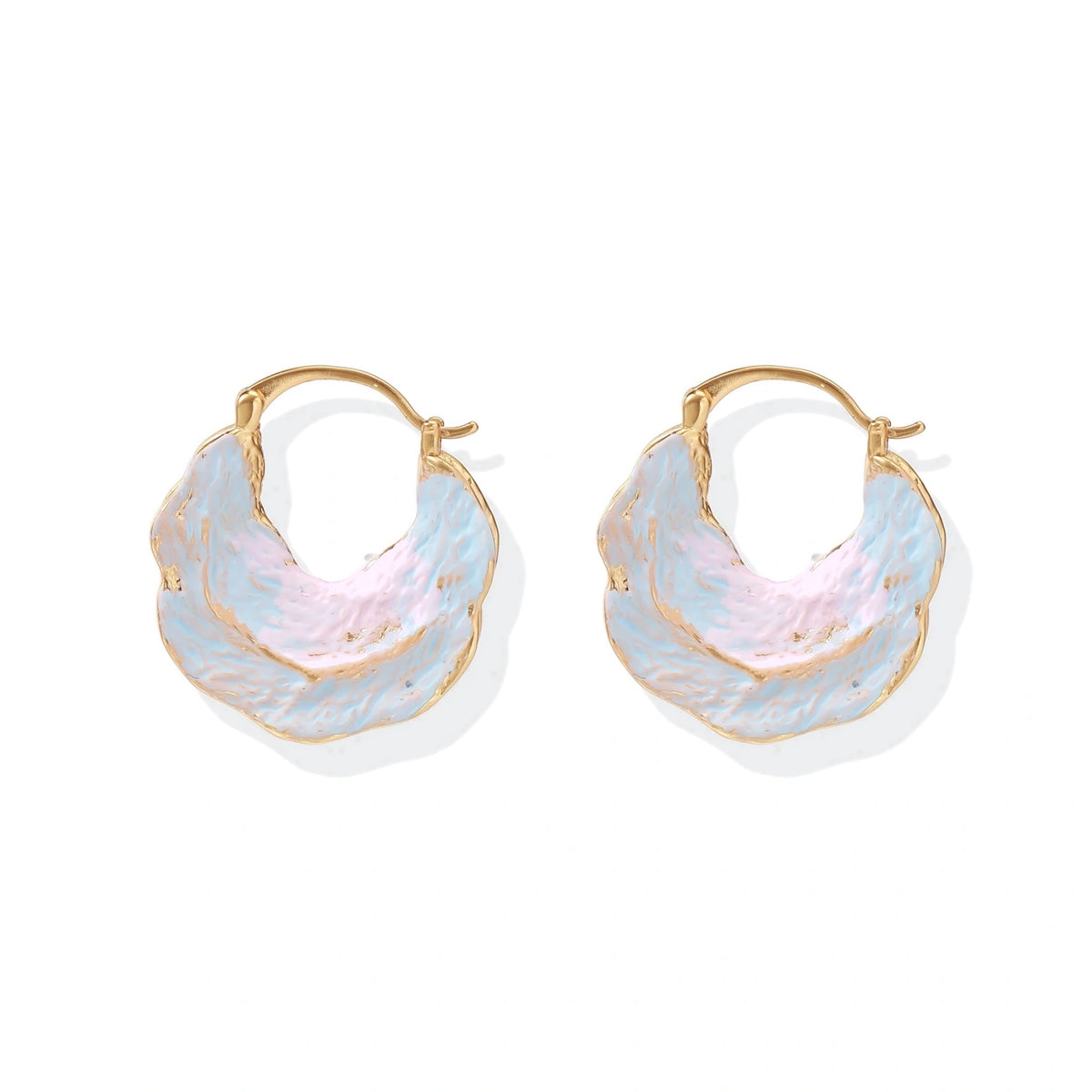 Shell-shaped hoop earrings with iridescent blue-pink enamel and gold trim on cream background