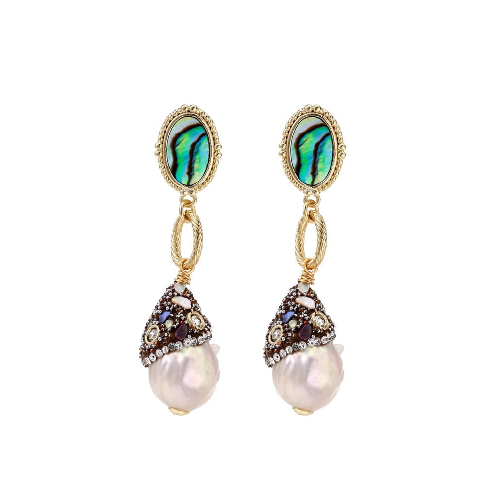 Gold drop earrings with iridescent abalone studs, rope links, jeweled caps and white baroque pearls on cream background