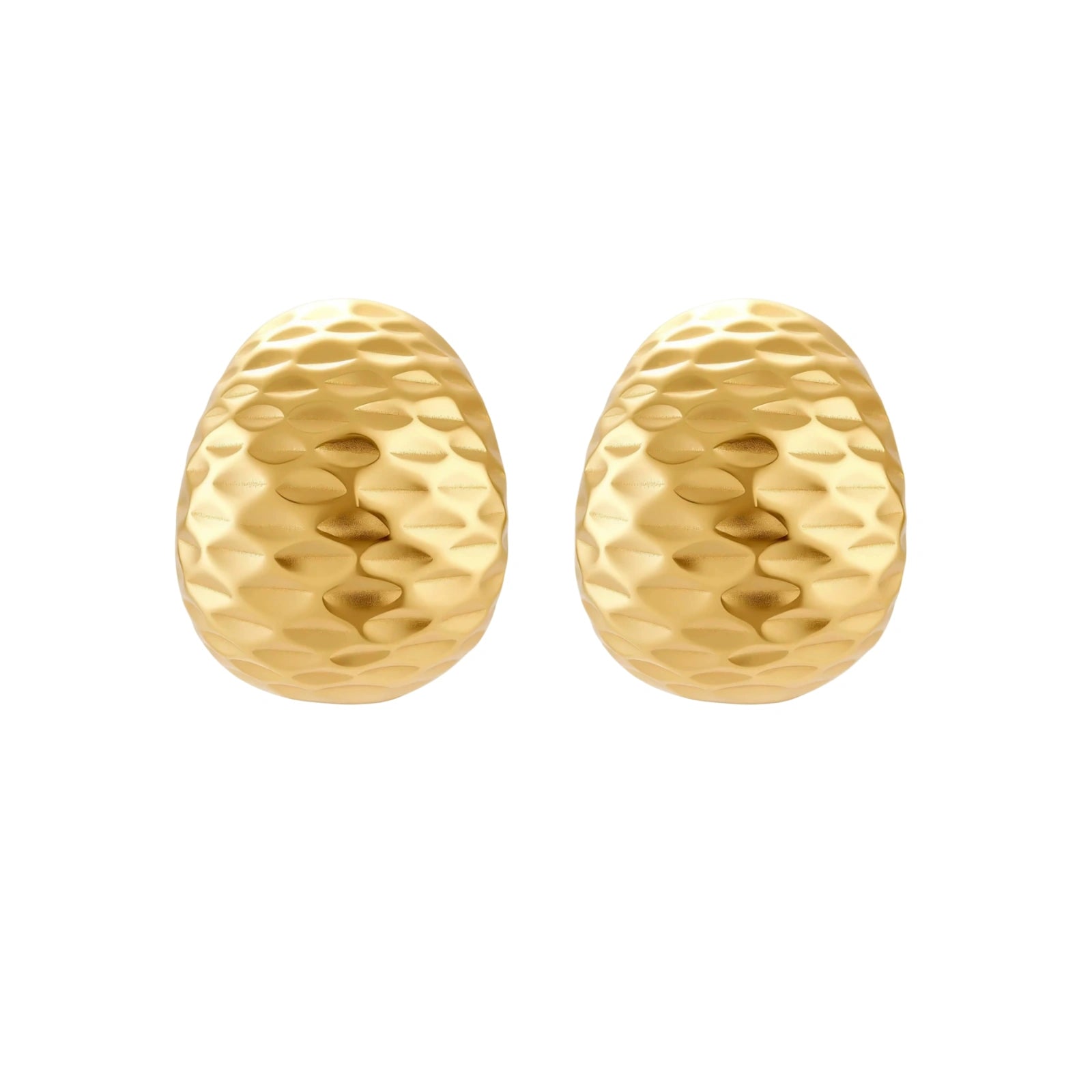 Pair of textured gold-plated sterling silver huggie earrings with dimpled surface finish on cream background.