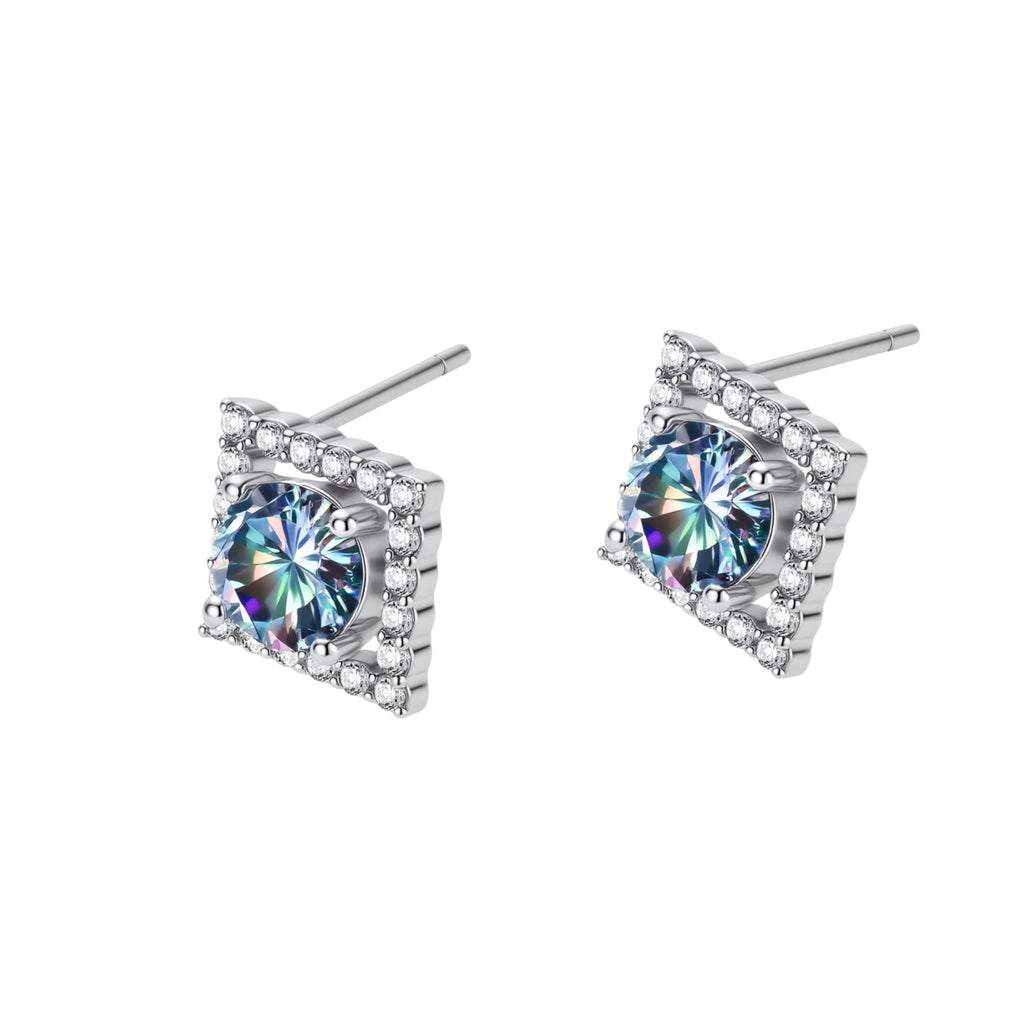 Diamond-shaped sterling silver stud earrings with rainbow moissanite centers surrounded by crystal halos
