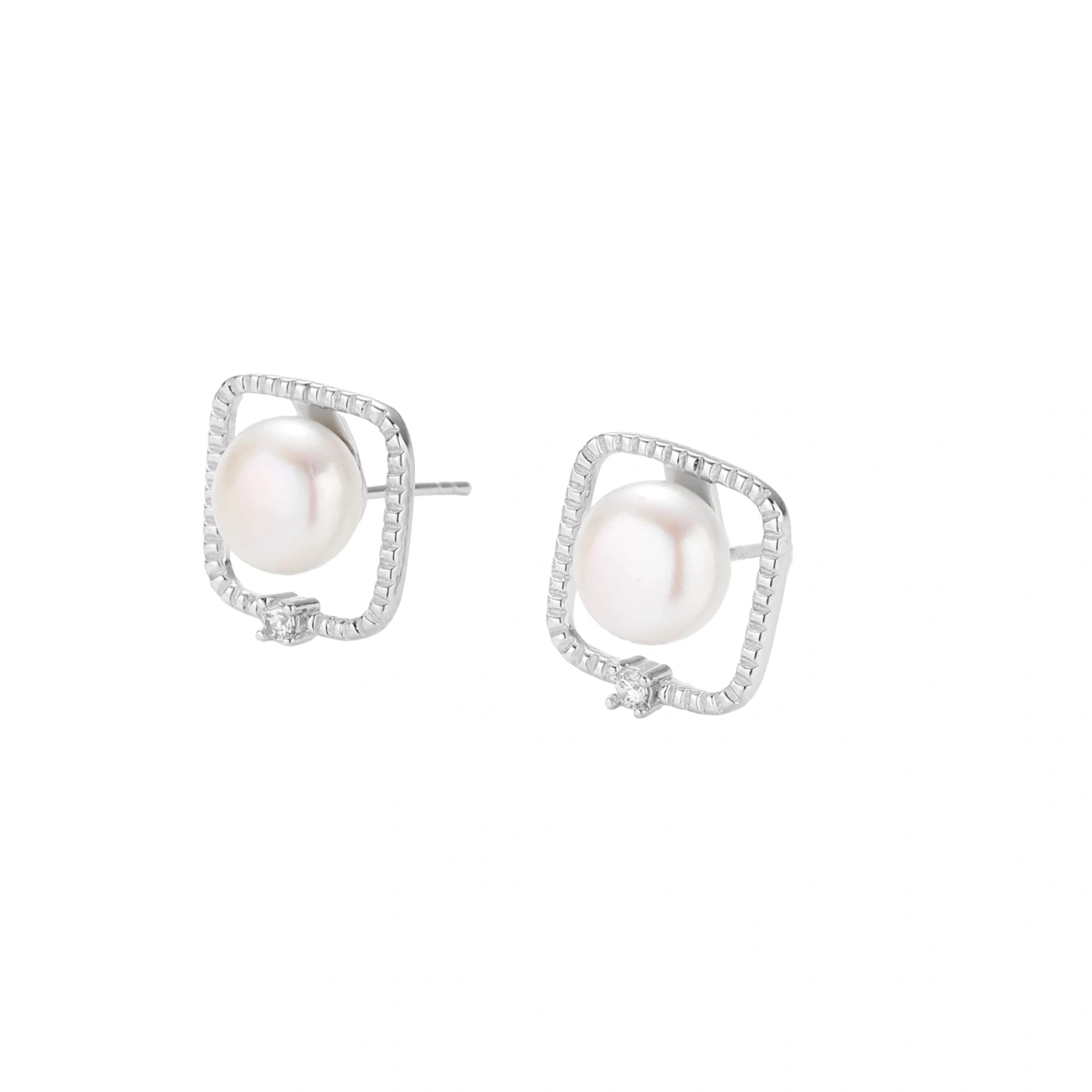 Rhodium-plated silver stud earrings with cushion frame, centered freshwater pearl, and tiny crystal accent