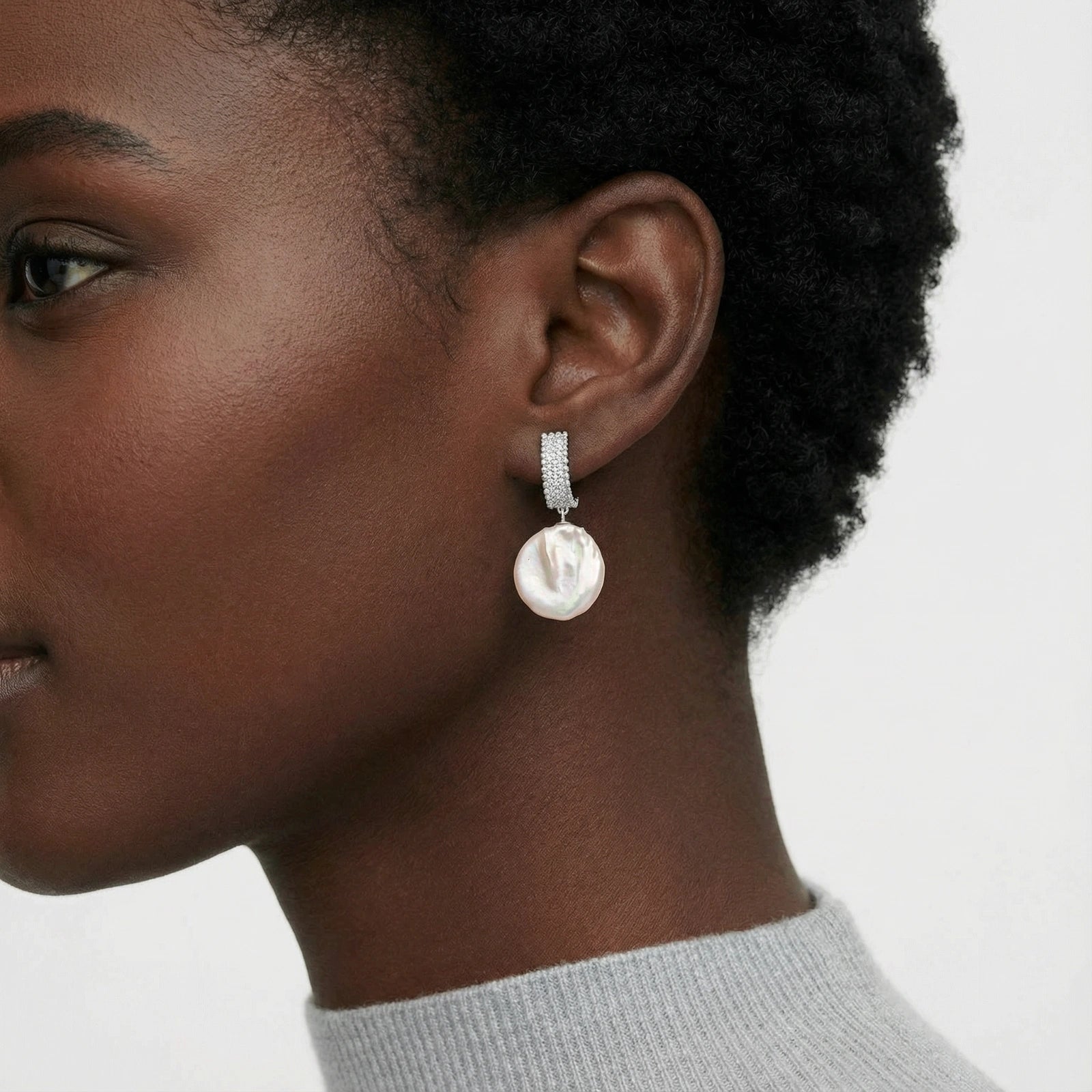 Boucles d'oreilles pendantes en perles baroques