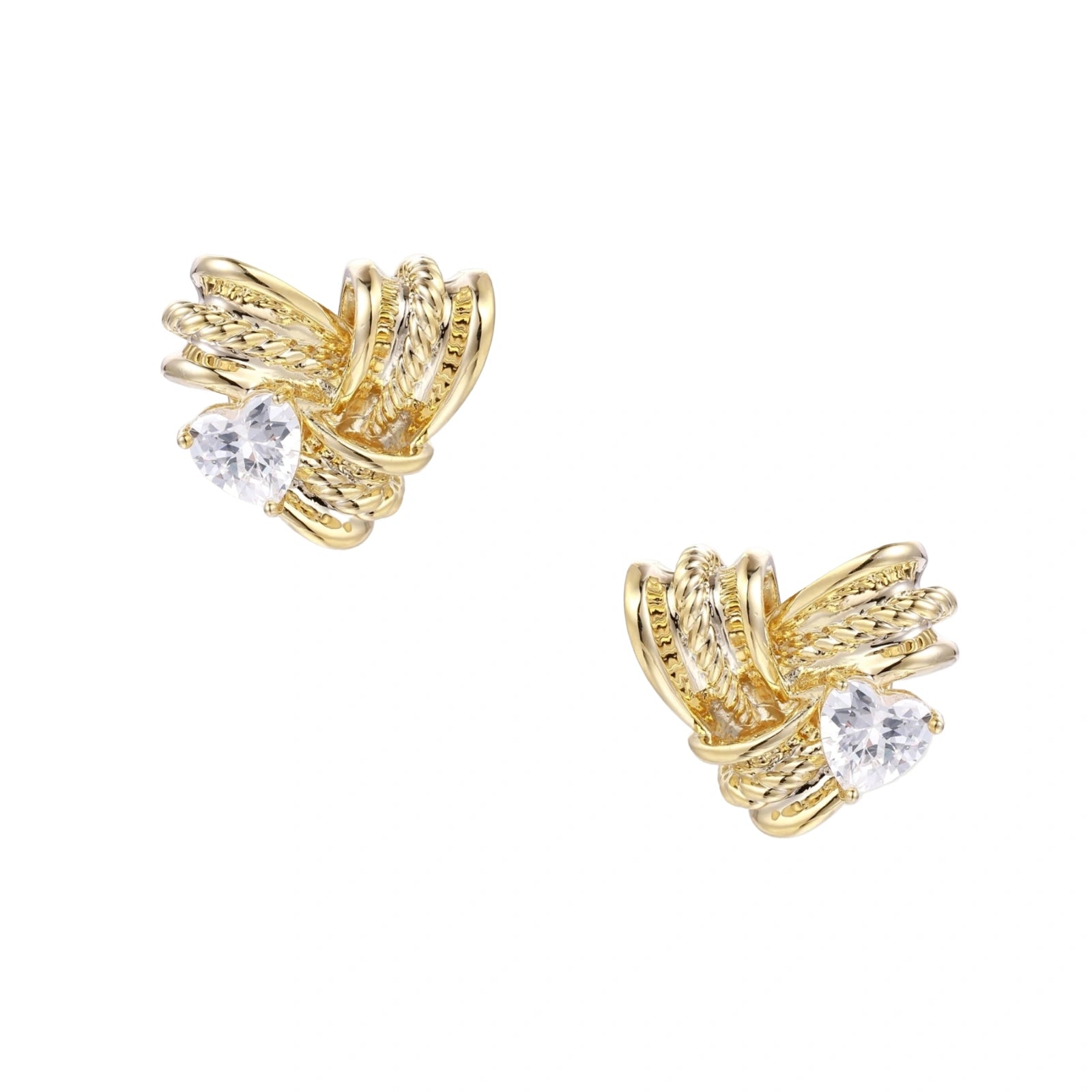 Pair of sculptural gold-plated wing stud earrings with zirconia stones on cream background, showing dimensional feather design
