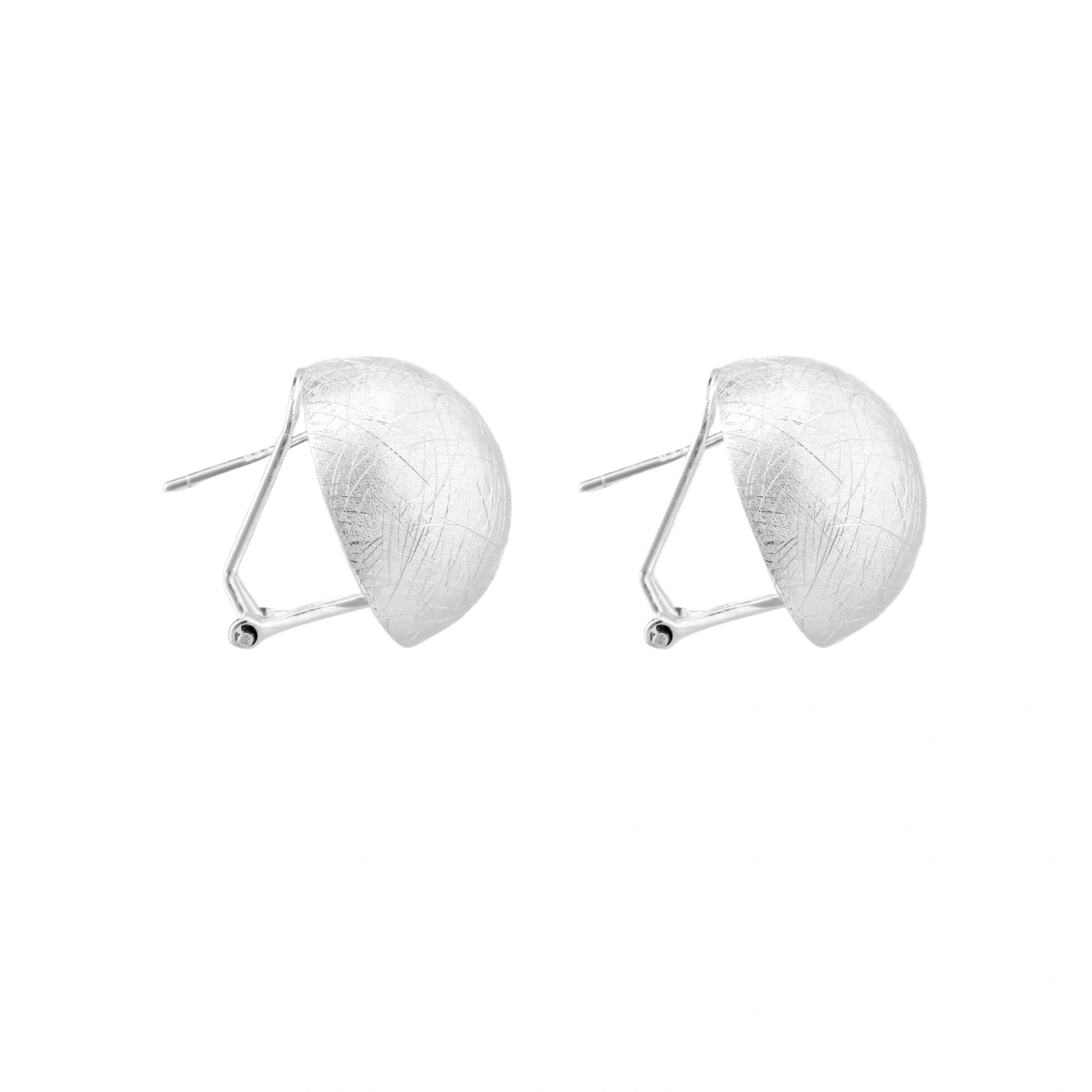 Brushed sterling silver half-dome clip-on earrings with textured surface against cream background