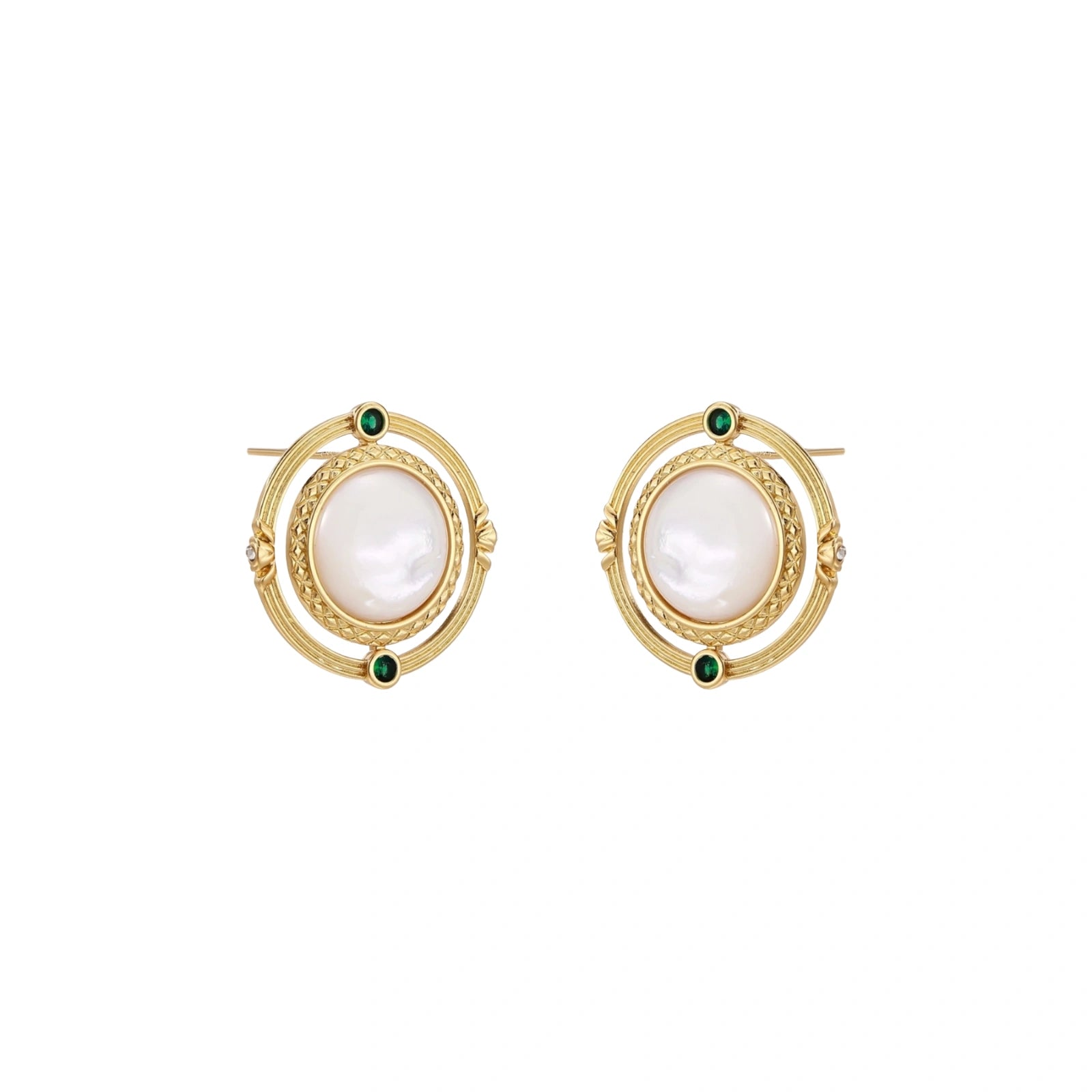 Circular gold stud earrings with iridescent mother-of-pearl center and green zirconia accents on cream background.