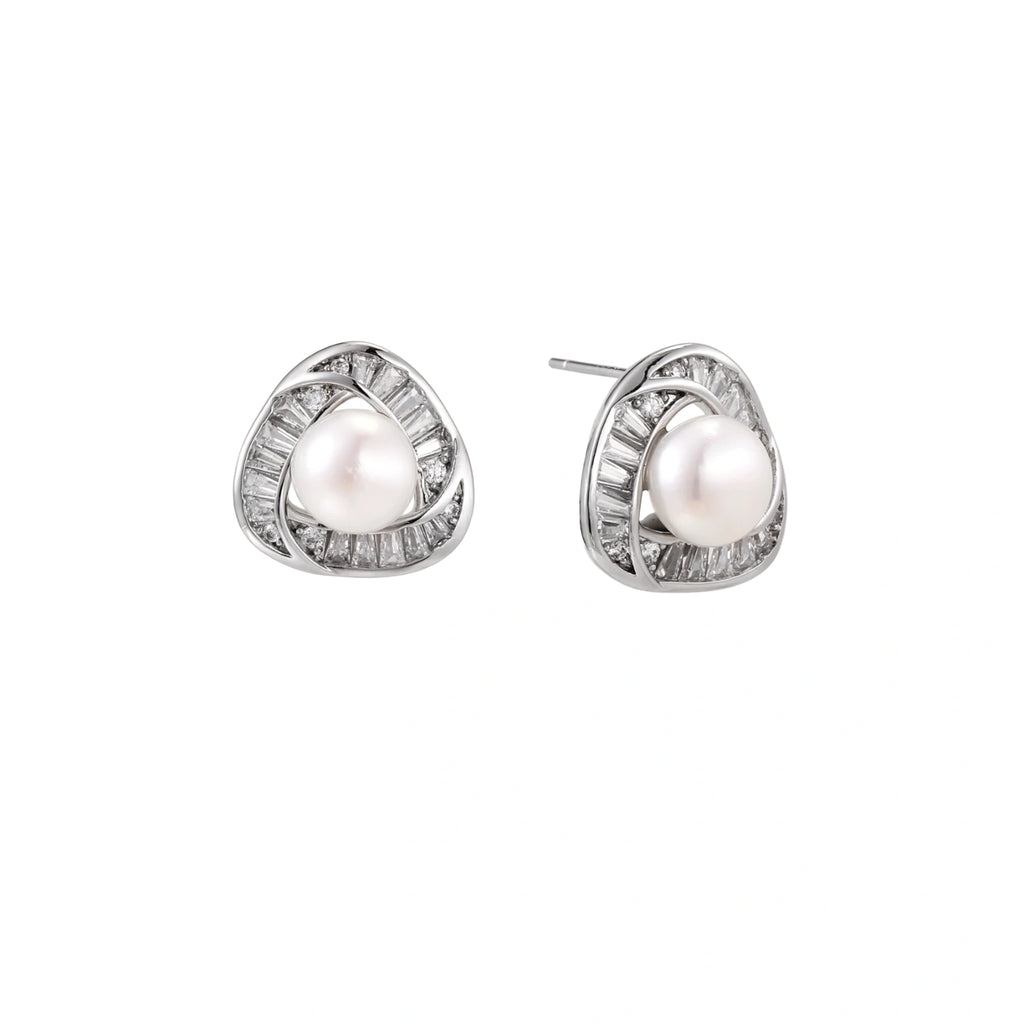 Triangular white gold plated stud earrings with central freshwater pearl and baguette-cut stones on white background