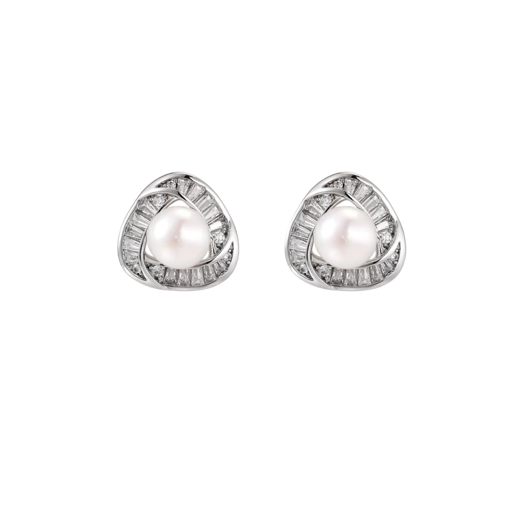 Triangular white gold plated stud earrings with central freshwater pearl and baguette-cut stones on white background