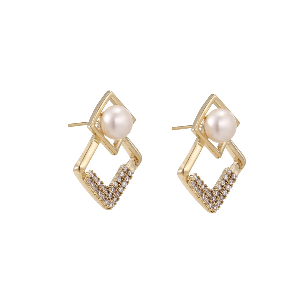 Gold-plated double square frame earrings with freshwater pearl and crystal accents on white background