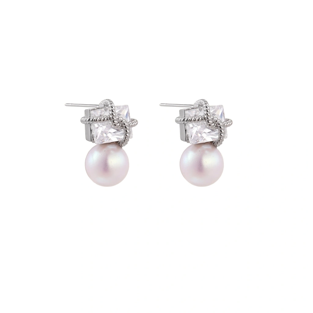 White gold stud earrings with square crystal stones in twisted frames and pink freshwater pearl drops below