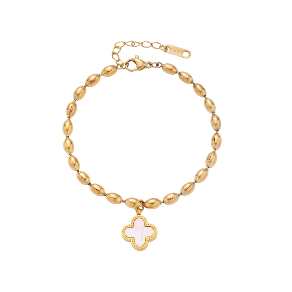 18K gold-plated oval bead chain bracelet with quatrefoil clover charm featuring mother of pearl inlay on cream background