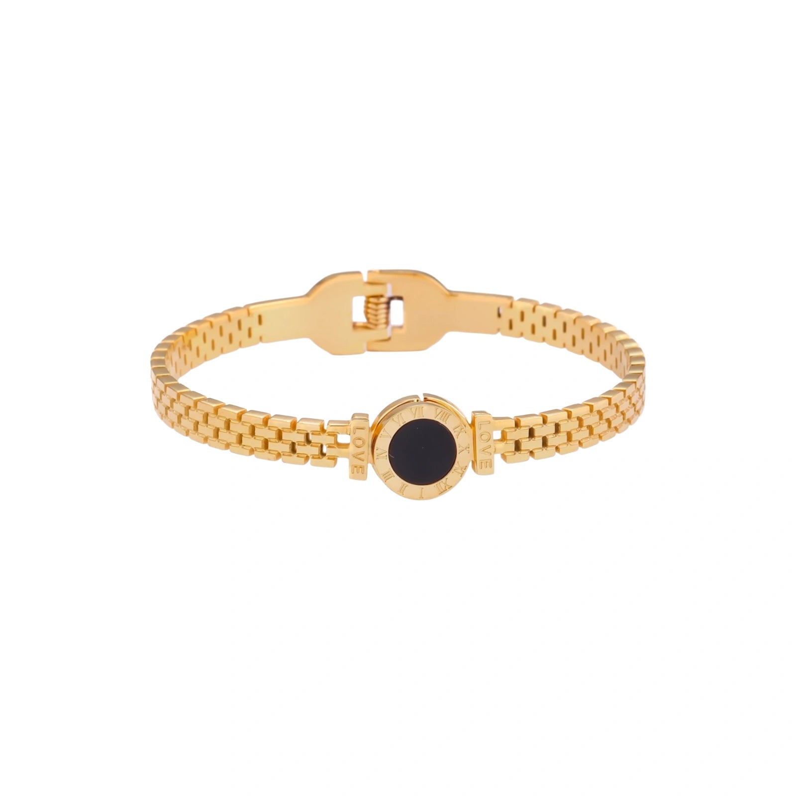 Gold mesh bracelet with circular black mother of pearl medallion featuring Roman numeral engravings and hinged clasp