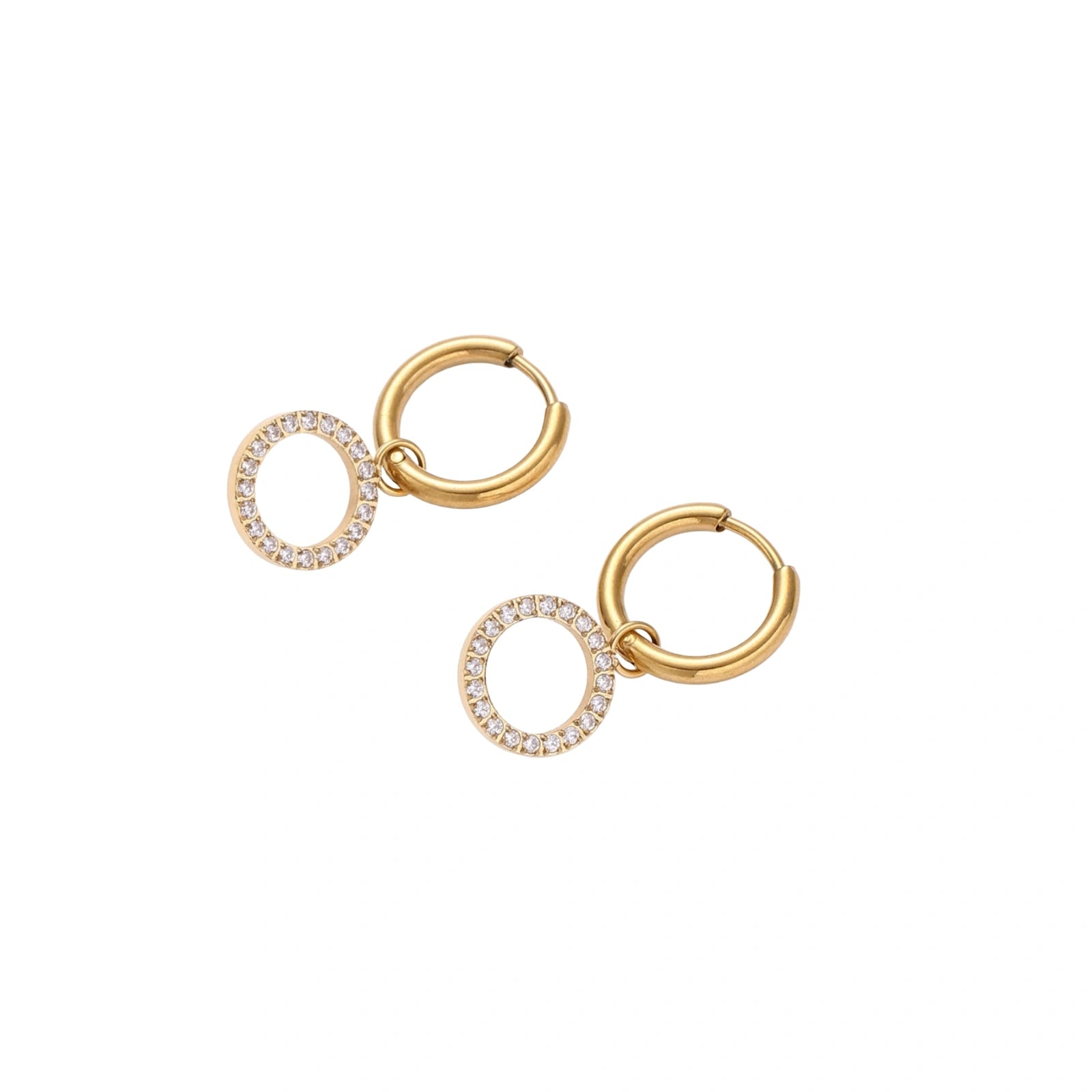 Gold-plated huggie hoop earrings with CZ-studded open circle charms on beige background