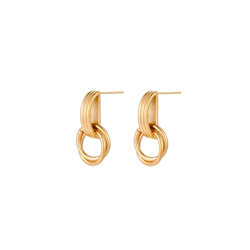 Gold stud earrings with vertical ridged bar connecting to triple interlocking circular rings on white background