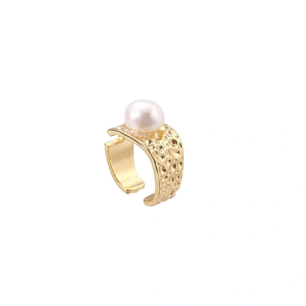 Wide gold-plated ring with organic textured band and white freshwater pearl centerpiece