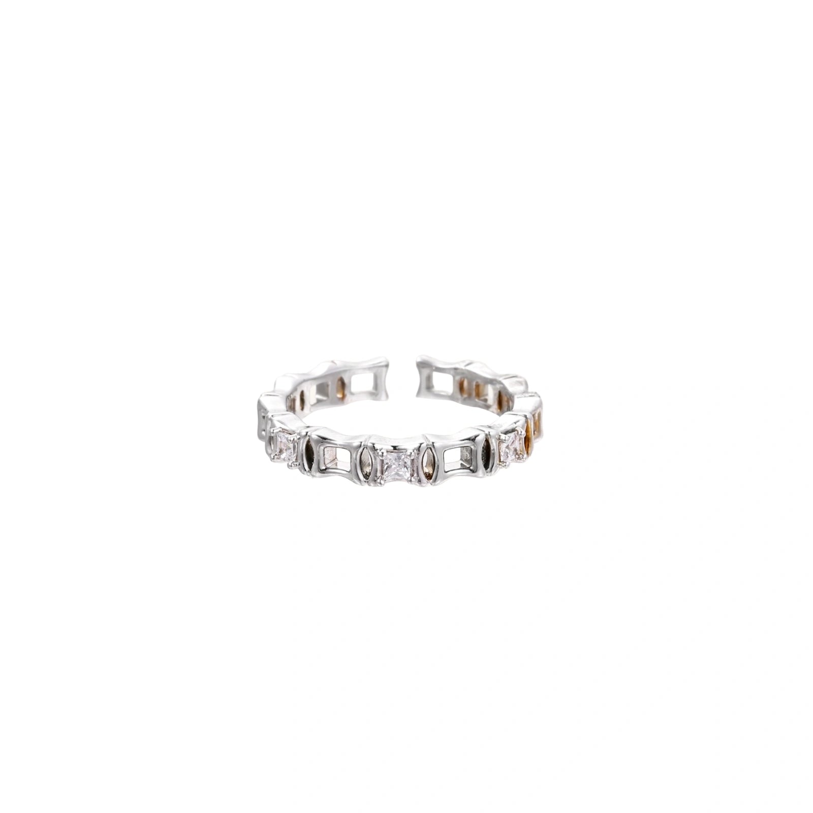 White gold plated ring with architectural lattice design and zirconia accents on cream background