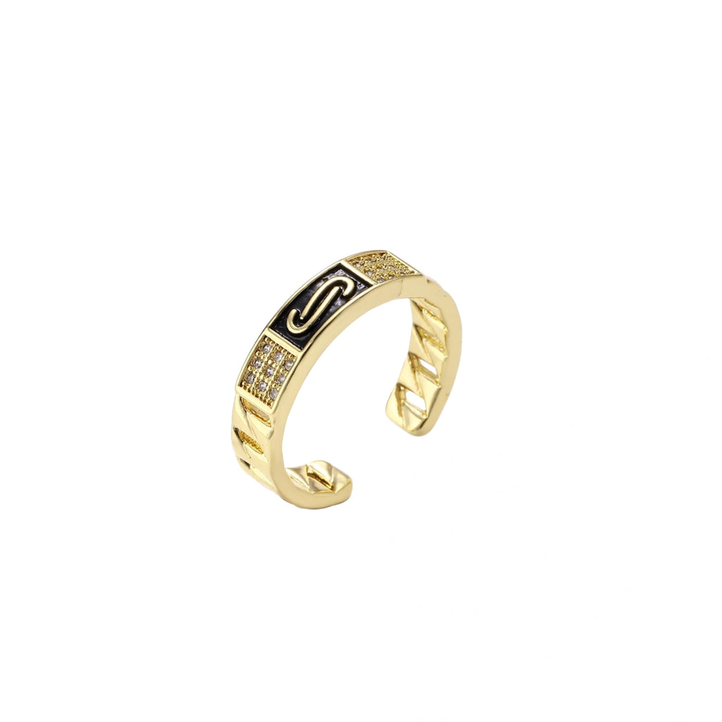 Gold-plated adjustable ring with twisted chain band, central cubic zirconia stone surrounded by crystal halo on cream background