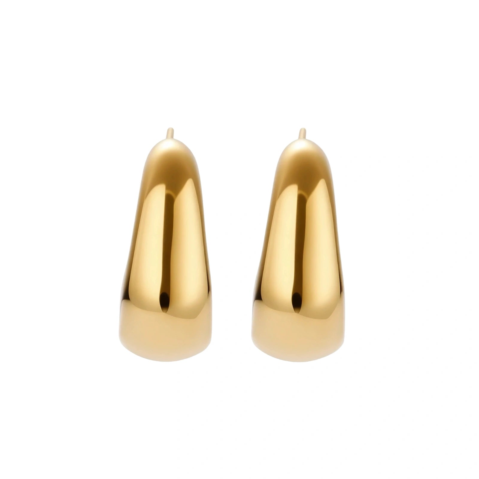 Close-up of curved gold-plated huggie earrings with sculptural design on white background, showing polished finish.