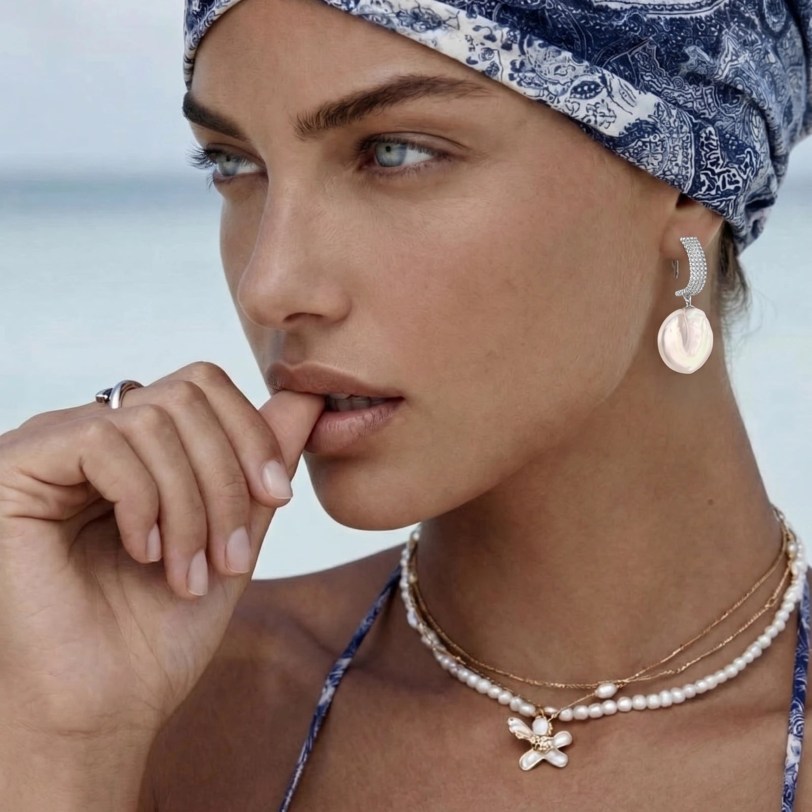 Boucles d'oreilles pendantes en perles baroques