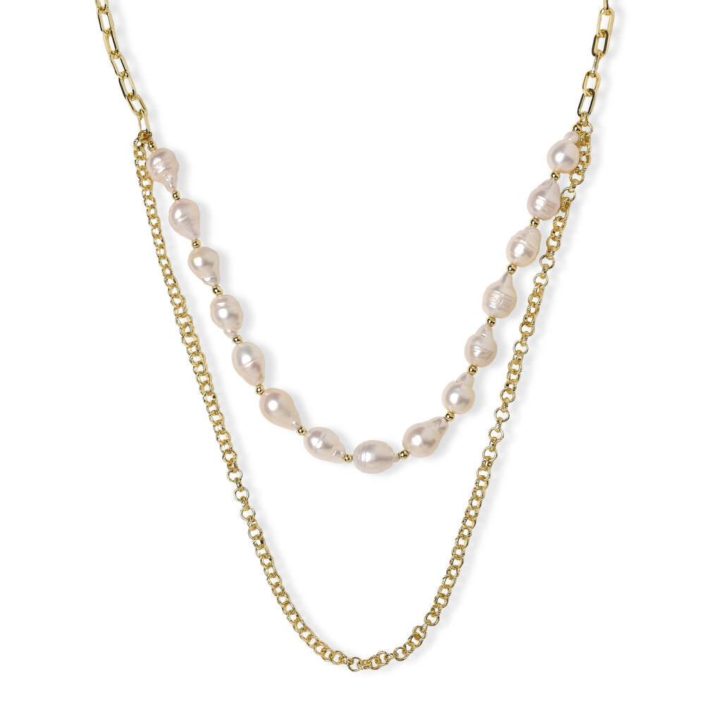 Layered gold chain necklace with organic baroque freshwater pearls and adjustable length on cream background